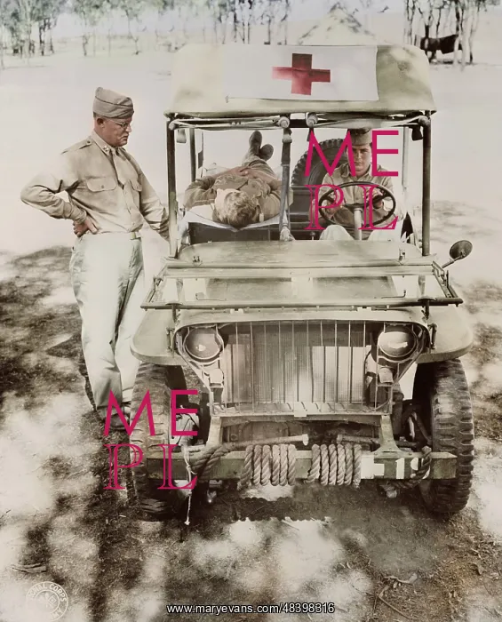 : Captain Nelson inspecting a half-ton jeep : Captain Nelson inspecting a half-ton jeep