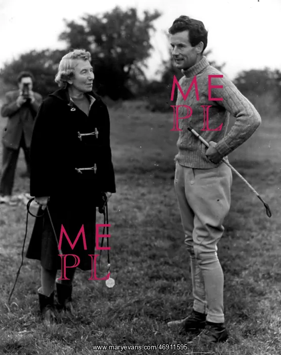 : Captain Peter Townsend and Norah Wilmott chatting : Captain Peter Townsend and Norah Wilmott chatting