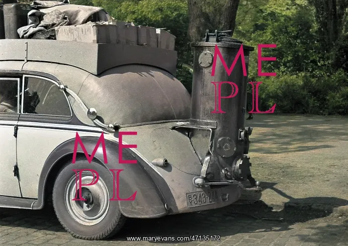 : Car with contraption on the back : Car with contraption on the back