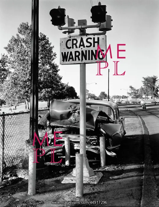 : Car crashed head-on into crash warning sign pole : Car crashed head-on into crash warning sign pole