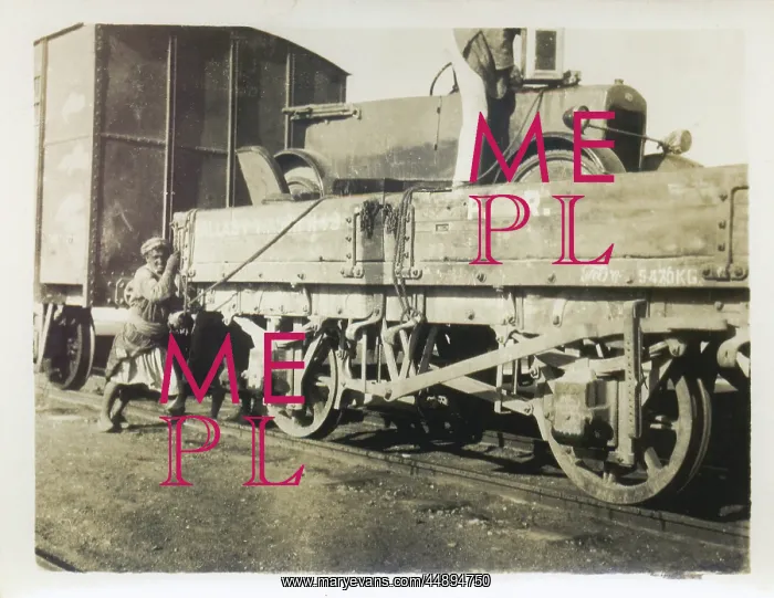 : Car being loaded onto a train, Middle East : Car being loaded onto a train, Middle East