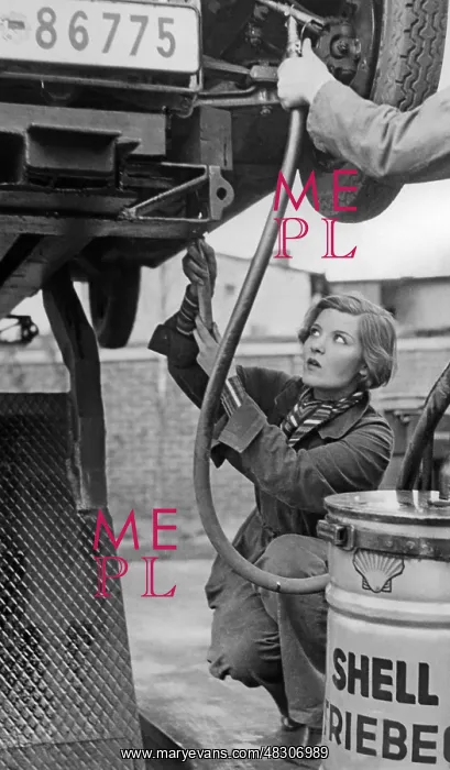 : Car mechanic at work, 1932 : Car mechanic at work, 1932