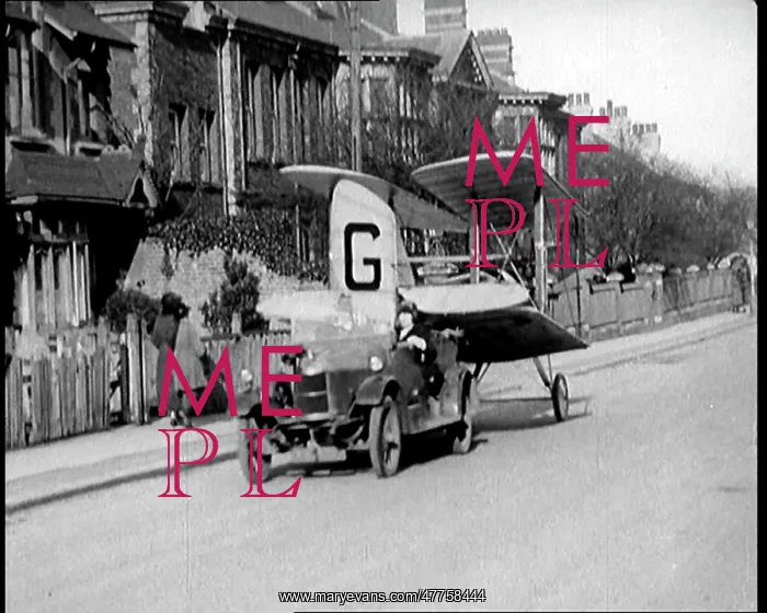 : A Car Towing a Small Aeroplane With Its Wings : A Car Towing a Small Aeroplane With Its Wings