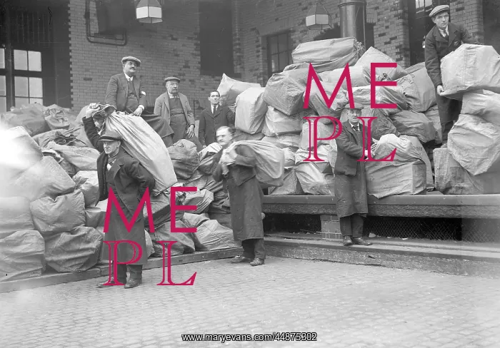 : Carrying Mail Sacks : Carrying Mail Sacks