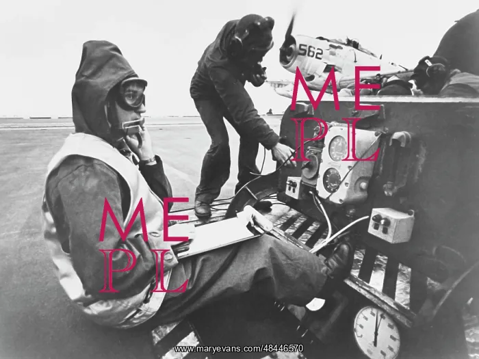 : A catapult officer at his station during flight : A catapult officer at his station during flight