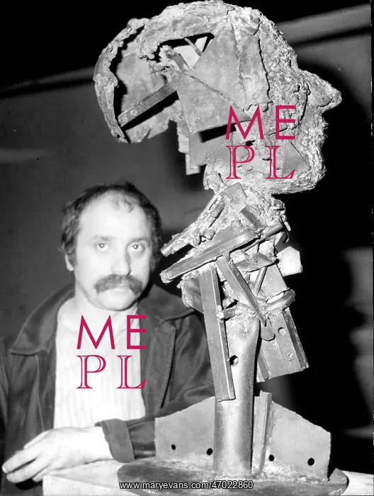  : Cesar Baldaccini with ironwork sculpture, Paris