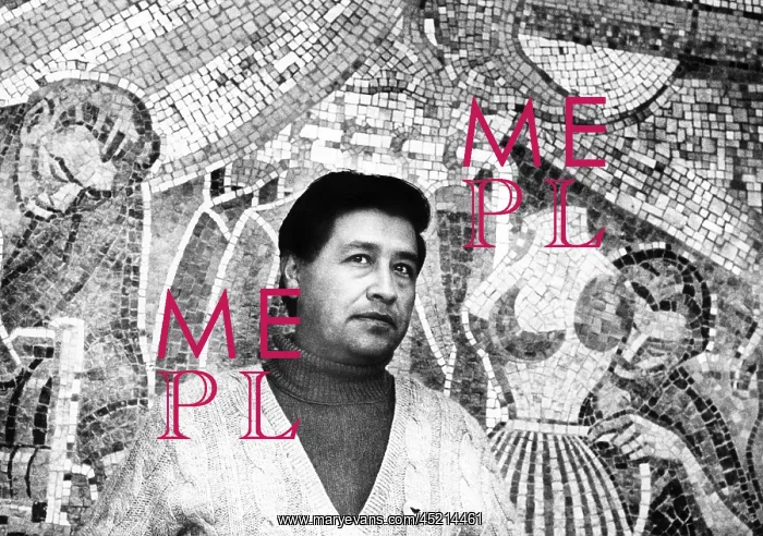 : Cesar Chavez stands in front of The Delano ? : Cesar Chavez stands in front of The Delano ?