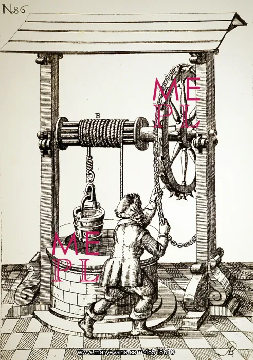 : CHAIN WHEEL being used to work the windlass on a well head : CHAIN WHEEL being used to work the windlass on a well head