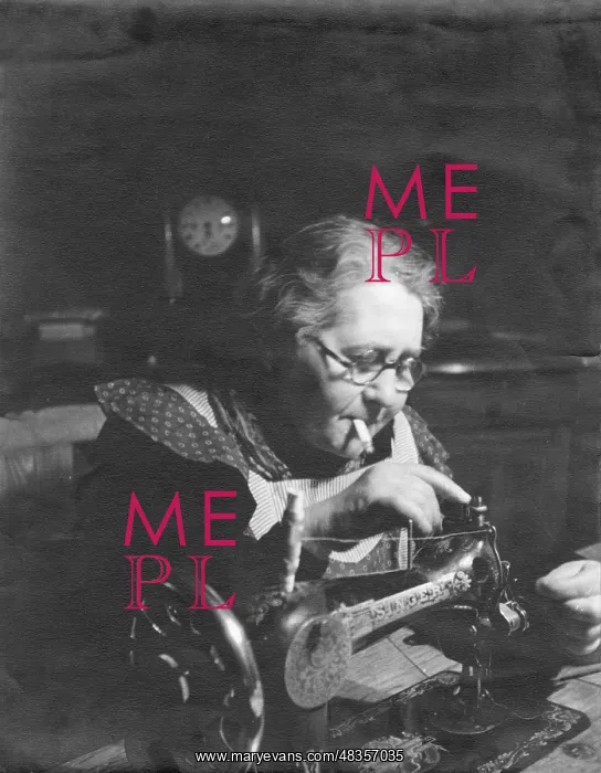 : Characterful old lady with sewing machine : Characterful old lady with sewing machine