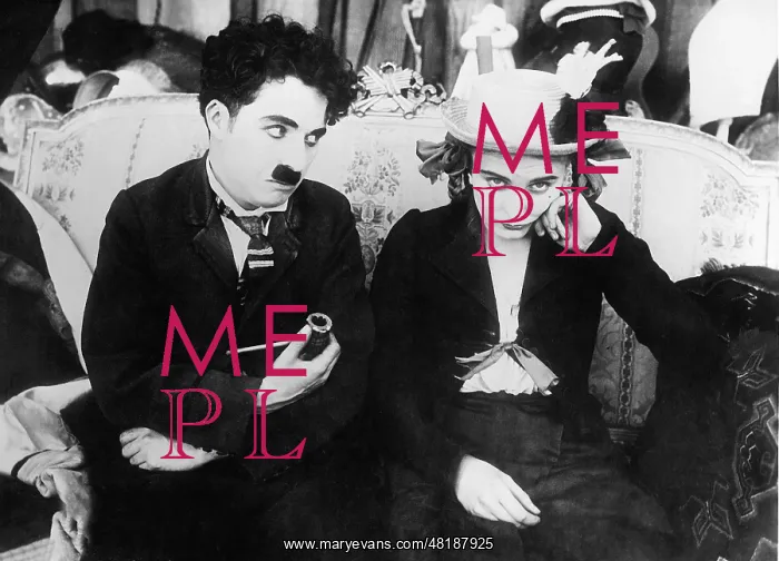  : Charles Chaplin and Edna Purviance in Behind the Screen, 1