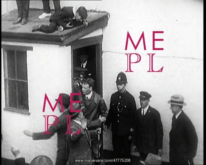 : Charles Lindbergh Emerges From a Building At : Charles Lindbergh Emerges From a Building At
