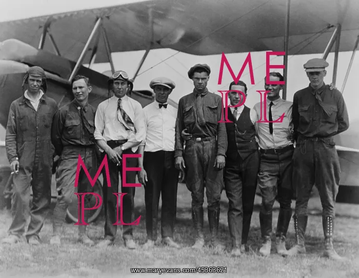 : Charles Lindbergh with seven other men, in front : Charles Lindbergh with seven other men, in front