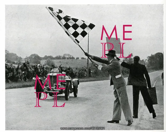 : Charley Dodson crossing the finishing line : Charley Dodson crossing the finishing line