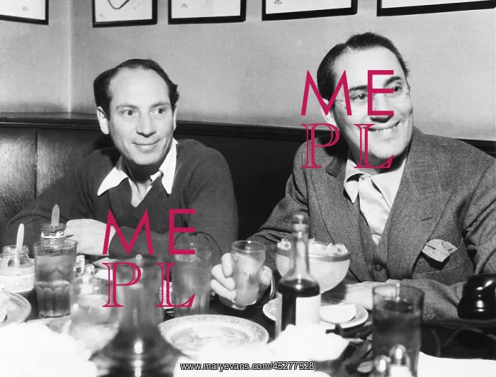 : Chico (left) and Groucho Marx at lunch in the famous : Chico (left) and Groucho Marx at lunch in the famous