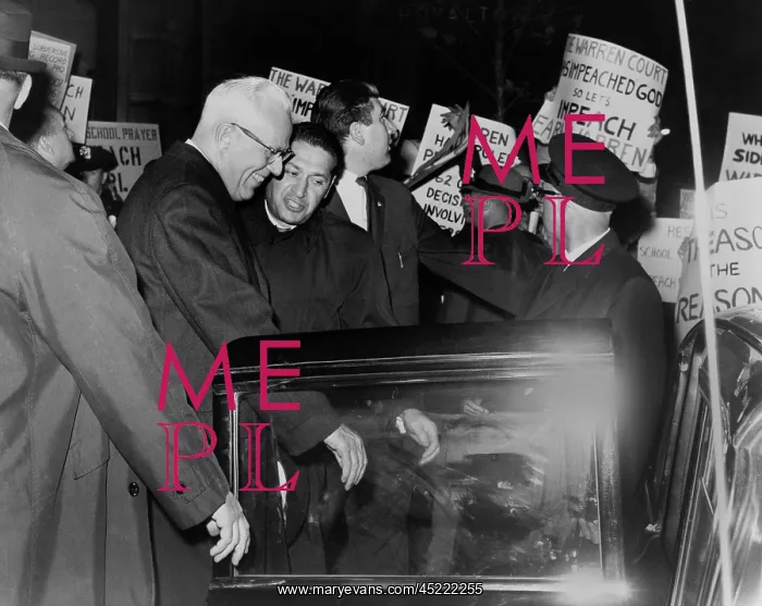 : Chief Justice Earl Warren is escorted through ? : Chief Justice Earl Warren is escorted through ?