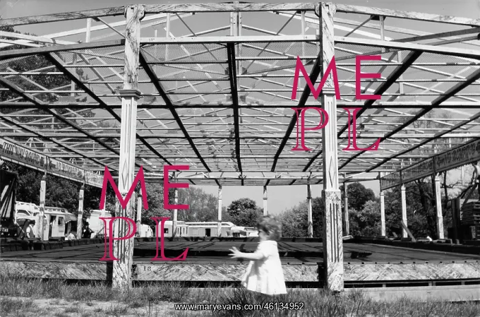 : Child at a deserted fairground : Child at a deserted fairground