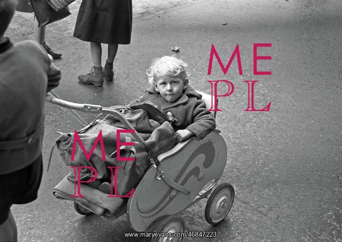  : Child in a pushchair