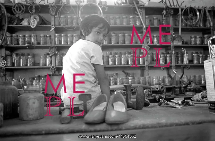 : Child on rural store counter in Groot Marico : Child on rural store counter in Groot Marico
