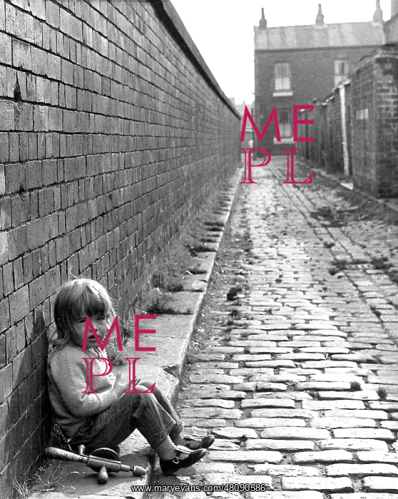 : Child sitting in an alleyway : Child sitting in an alleyway
