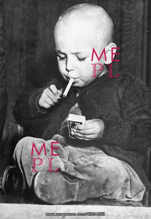 : Child smoking a cigarette : Child smoking a cigarette