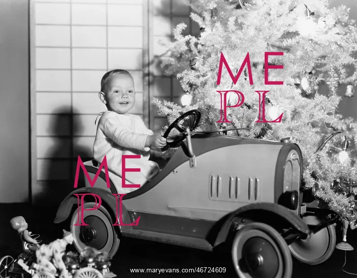 : Child with toy car under Christmas tree : Child with toy car under Christmas tree