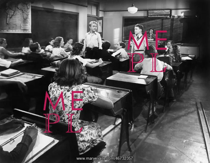 : Children in a class room with a teacher and two : Children in a class room with a teacher and two