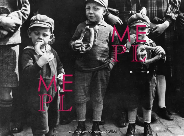 : Children eating pretzels, 1932 : Children eating pretzels, 1932
