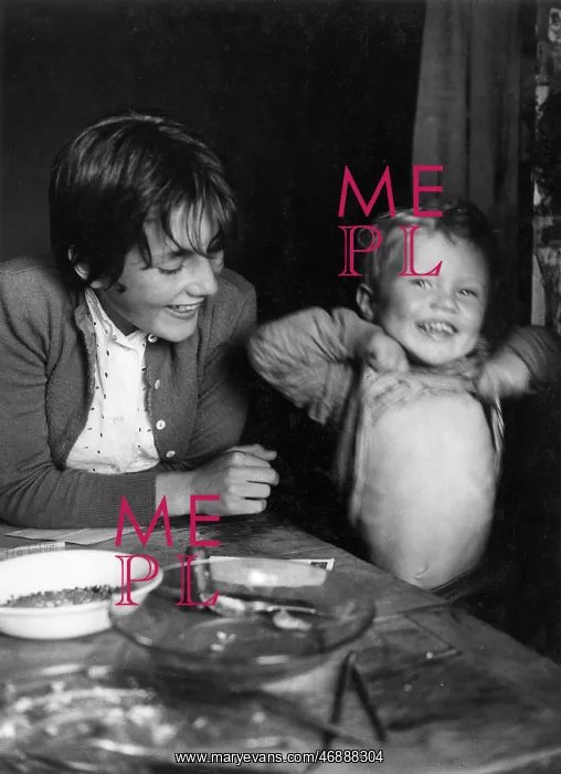  : Two children having fun at a table