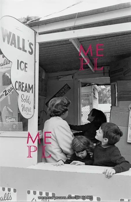 : Three children inside an ice cream kiosk : Three children inside an ice cream kiosk