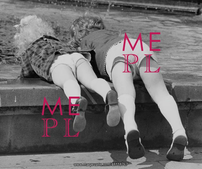 : Children leaning over the edge of a pool : Children leaning over the edge of a pool