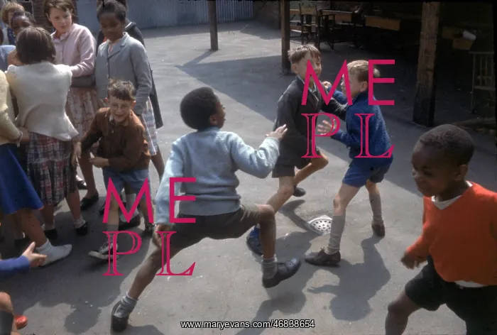 : Children in the playground at a Kilburn school : Children in the playground at a Kilburn school