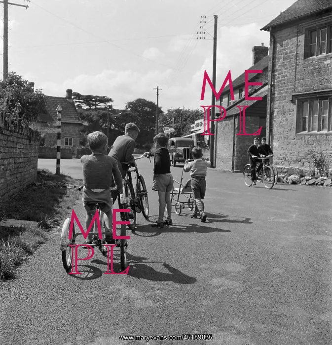 : Children playing on bicycles : Children playing on bicycles