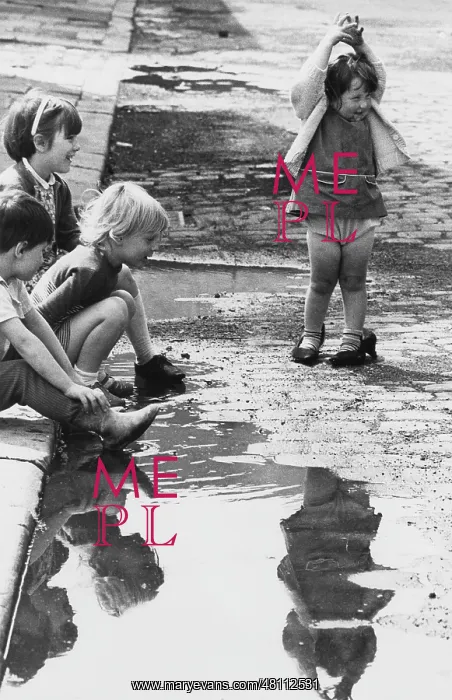 : Children playing near a puddle : Children playing near a puddle