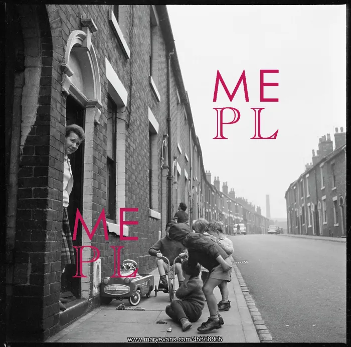 : Children playing on the pavement outside a house : Children playing on the pavement outside a house