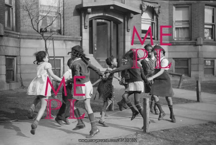 : Children playing ring around a rosie in one of the better ne : Children playing ring around a rosie in one of the better ne