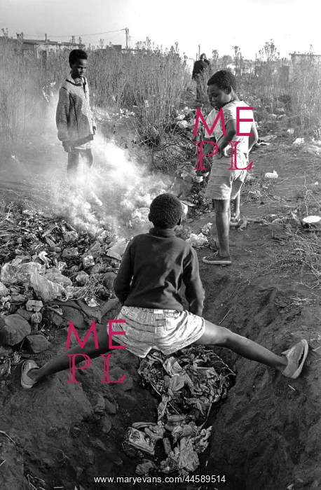 : Children playing in the veld in Snake Park, Soweto, 1993 : Children playing in the veld in Snake Park, Soweto, 1993