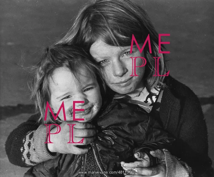 : Two children posing for the camera : Two children posing for the camera