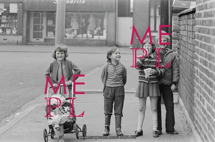 : Four children with pram containing a guy : Four children with pram containing a guy