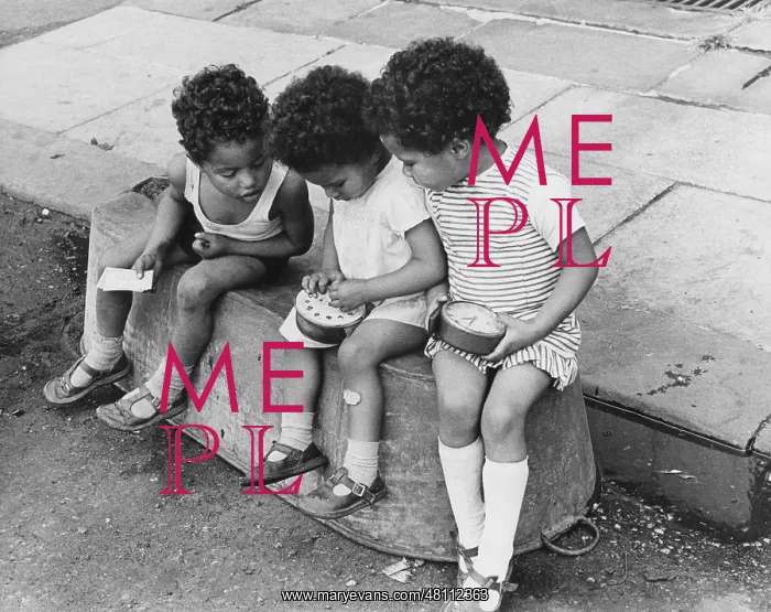 : Three children sitting on a tin bath : Three children sitting on a tin bath