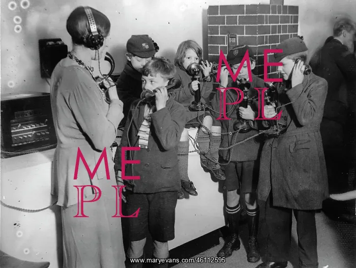 : Children at a telephone exhibition : Children at a telephone exhibition