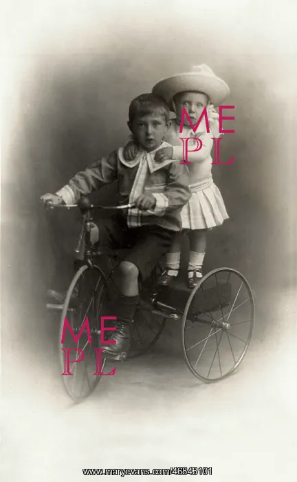 : Children on a tricycle : Children on a tricycle