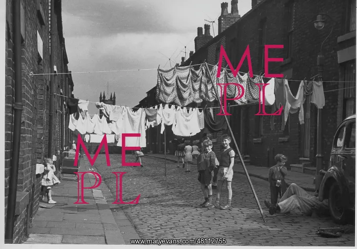 : Children and washing lines in a street : Children and washing lines in a street