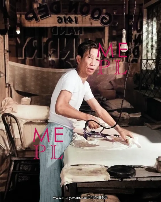 : Chinese Laundry Man Looking at Camera Working : Chinese Laundry Man Looking at Camera Working