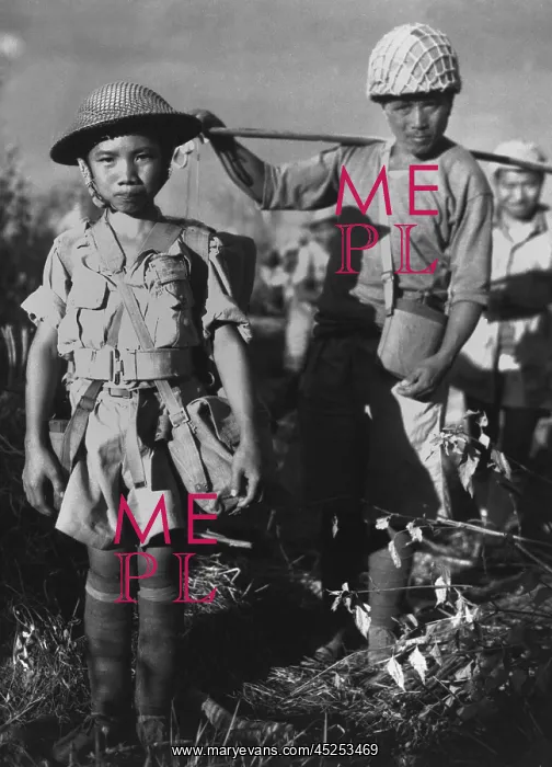 : Chinese soldier, age 10, with heavy pack, is a : Chinese soldier, age 10, with heavy pack, is a