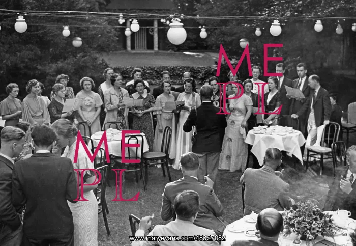 : The choir of Columbia University sings at areception, 1937 : The choir of Columbia University sings at areception, 1937