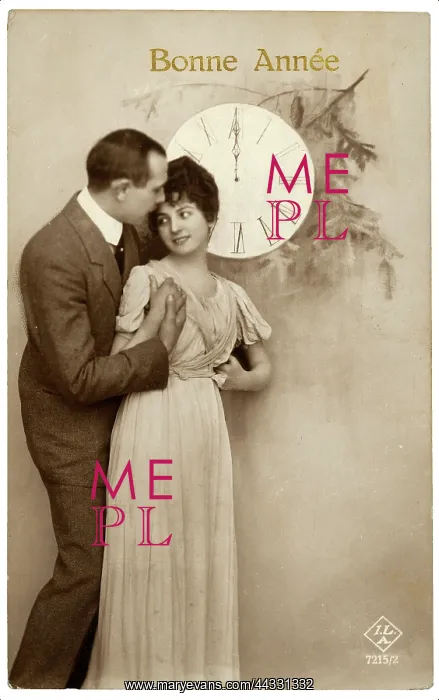 : Christmas. Portrait of a couple near a big clock striking midnight : Christmas. Portrait of a couple near a big clock striking midnight
