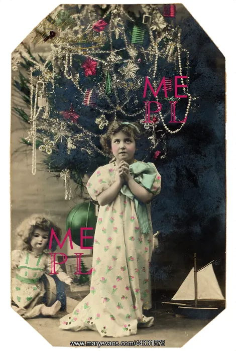: Christmas. Portrait of a young little girl praying under the Christmas tree : Christmas. Portrait of a young little girl praying under the Christmas tree