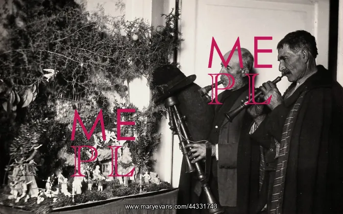 : Christmas. Two men playing a bagpipe and a fife in front of a nativity scene : Christmas. Two men playing a bagpipe and a fife in front of a nativity scene