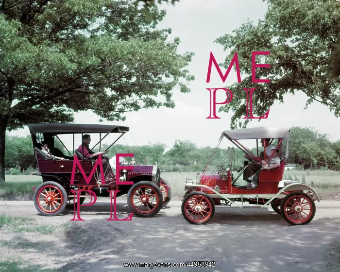 : Two Circa Antique Automobiles with Anonymous Silhouetted : Two Circa Antique Automobiles with Anonymous Silhouetted