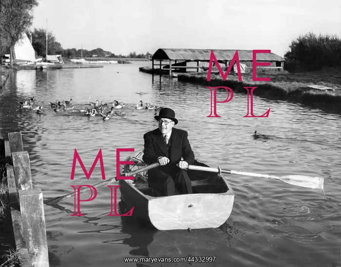 : City gent boating to work : City gent boating to work